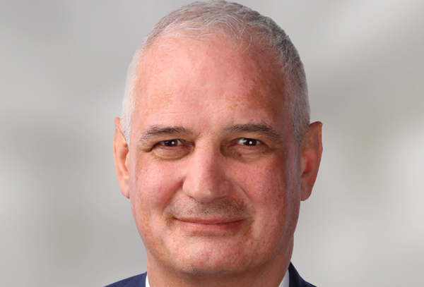 Charles Adams, Socio Director Global de Clifford Chance